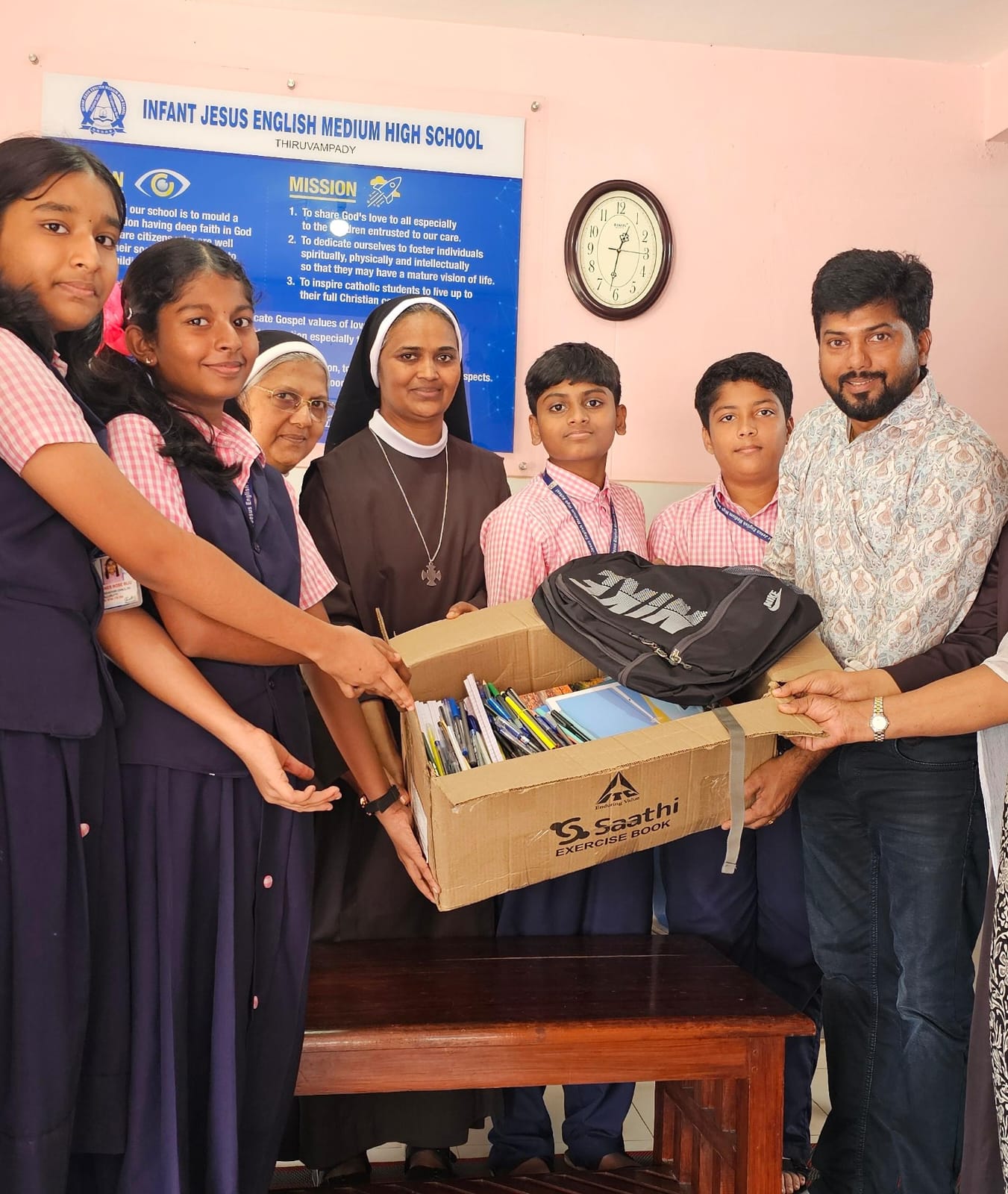 Hand over study materials to the Disha Charitable Society for AIDS Children.